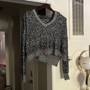 Size S, loose knit, cropped with hoodie sweater.